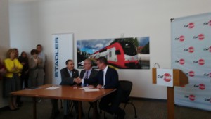 Caltrain CEO signs electrification contracts